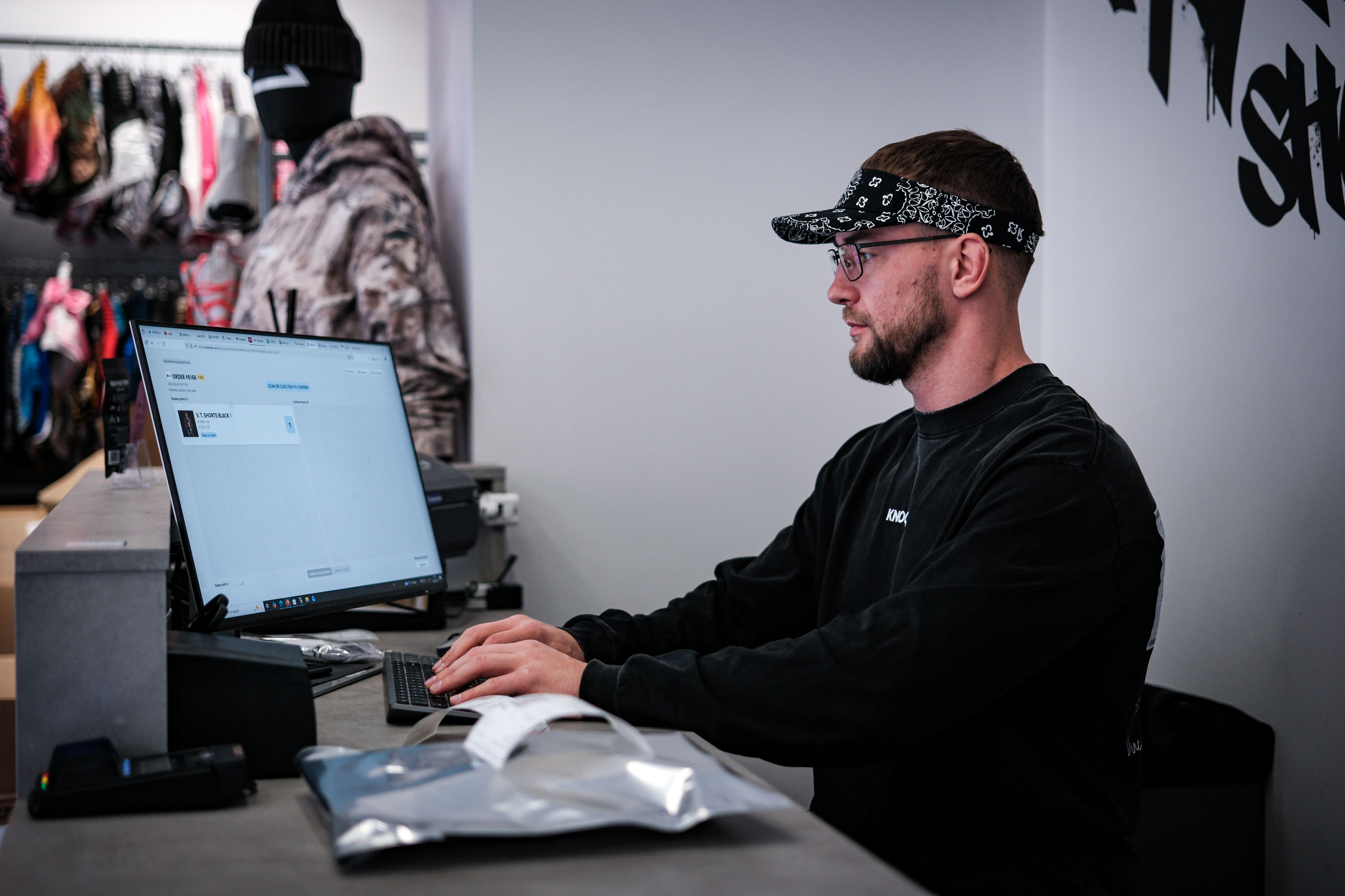 Knock team workspace with order fulfillment materials